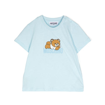 Moschino Kids light blue T-shirt with teddy bear motif, crafted from soft cotton, available at Lestyle Boutique Melbourne.