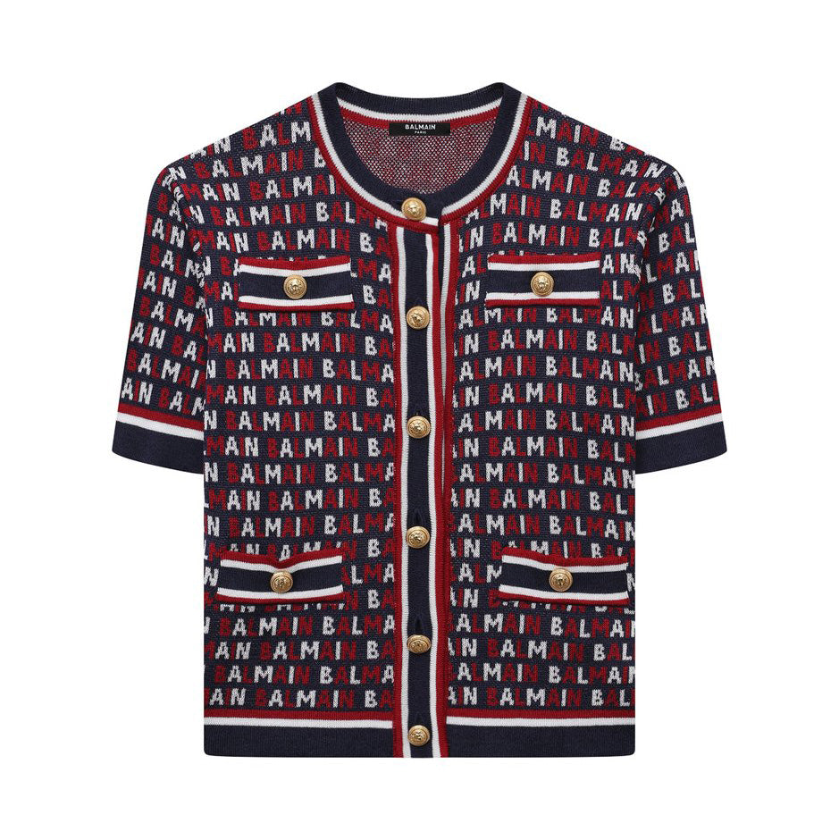 Balmain Kids sweatshirt featuring a stylish monogram design in navy and red. This premium piece is crafted from high-quality materials for comfort and durability. The short-sleeve style is perfect for casual outings, while the vibrant colors and logo print add a trendy touch. Ideal for young fashion enthusiasts looking to make a statement, available at Lestyle Boutique Melbourne.