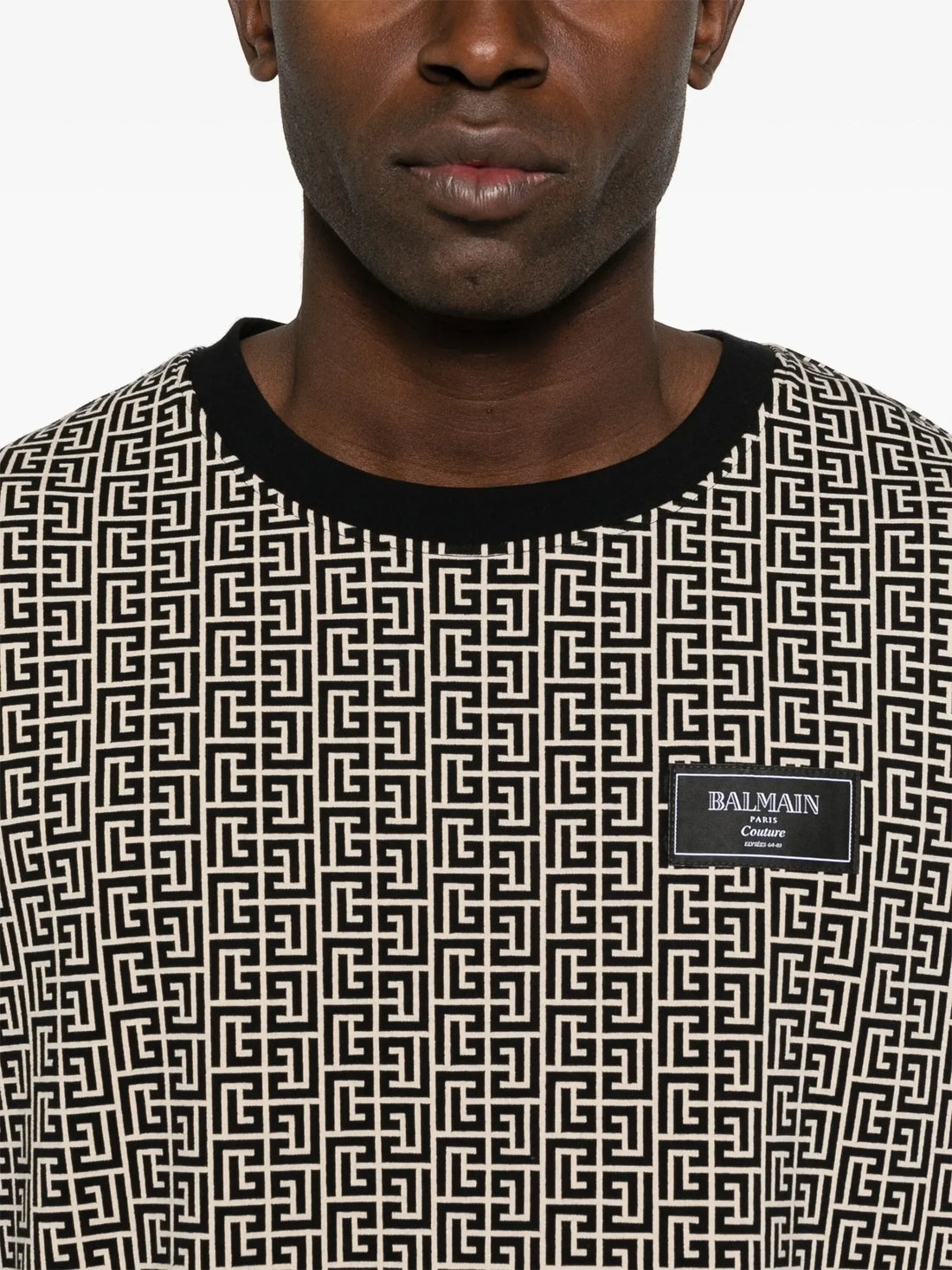 Balmain light beige PB Labyrinth Jacquard T-shirt featuring a crew neck, short sleeves, and a logo patch at the chest, available at Lestyle Boutique.