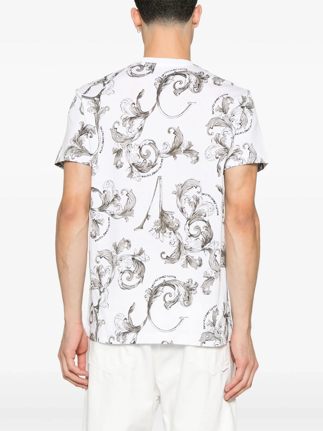Versace Jeans Couture Barocco-Print T-Shirt in white, showcasing an iconic all-over Barocco design with a crewneck and straight hem, crafted for comfort and style, available at Lestyle Boutique.