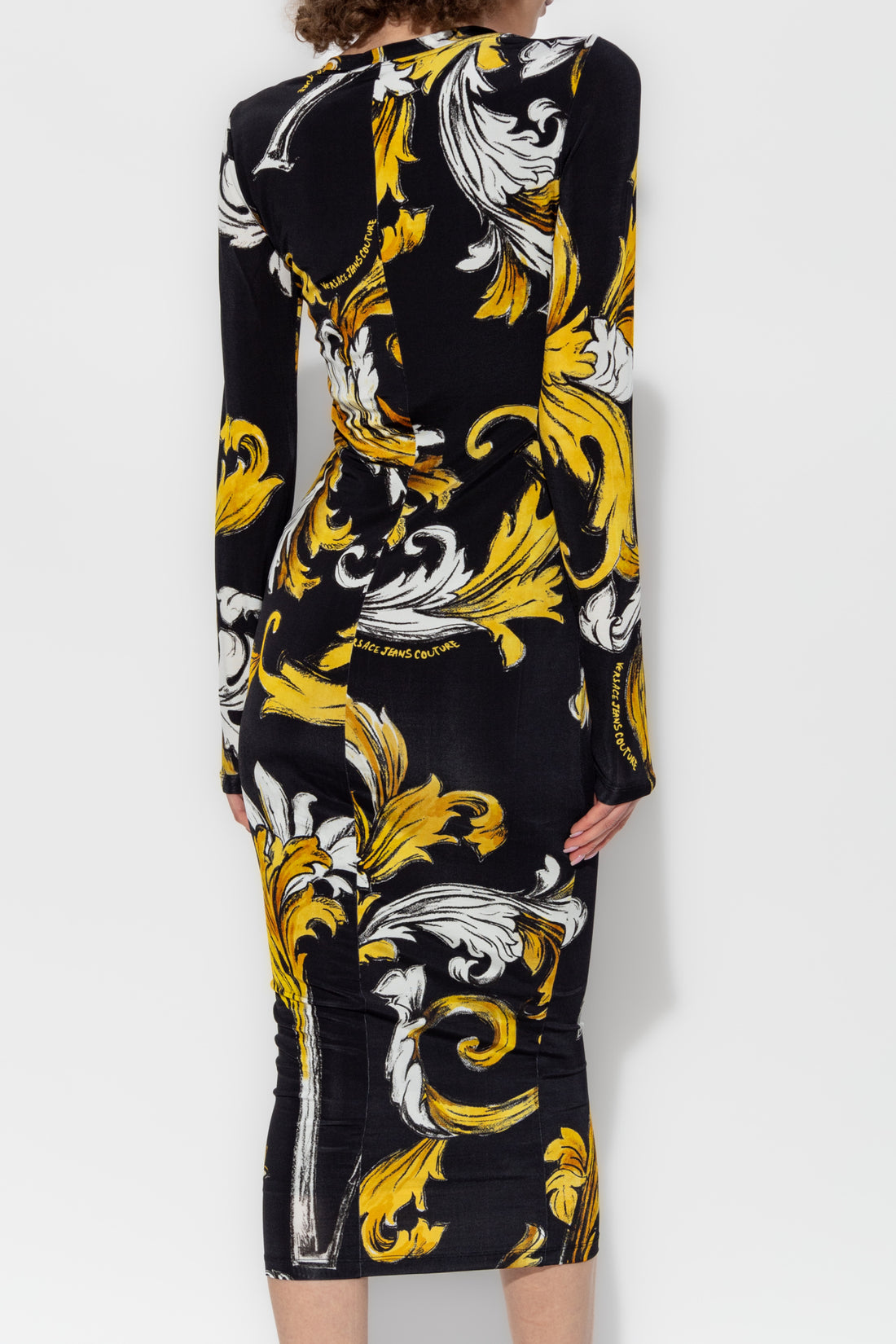 Versace Jeans Couture Black Midi Dress featuring an Outline Barocco print with long sleeves and a round neckline, available at Lestyle Boutique.