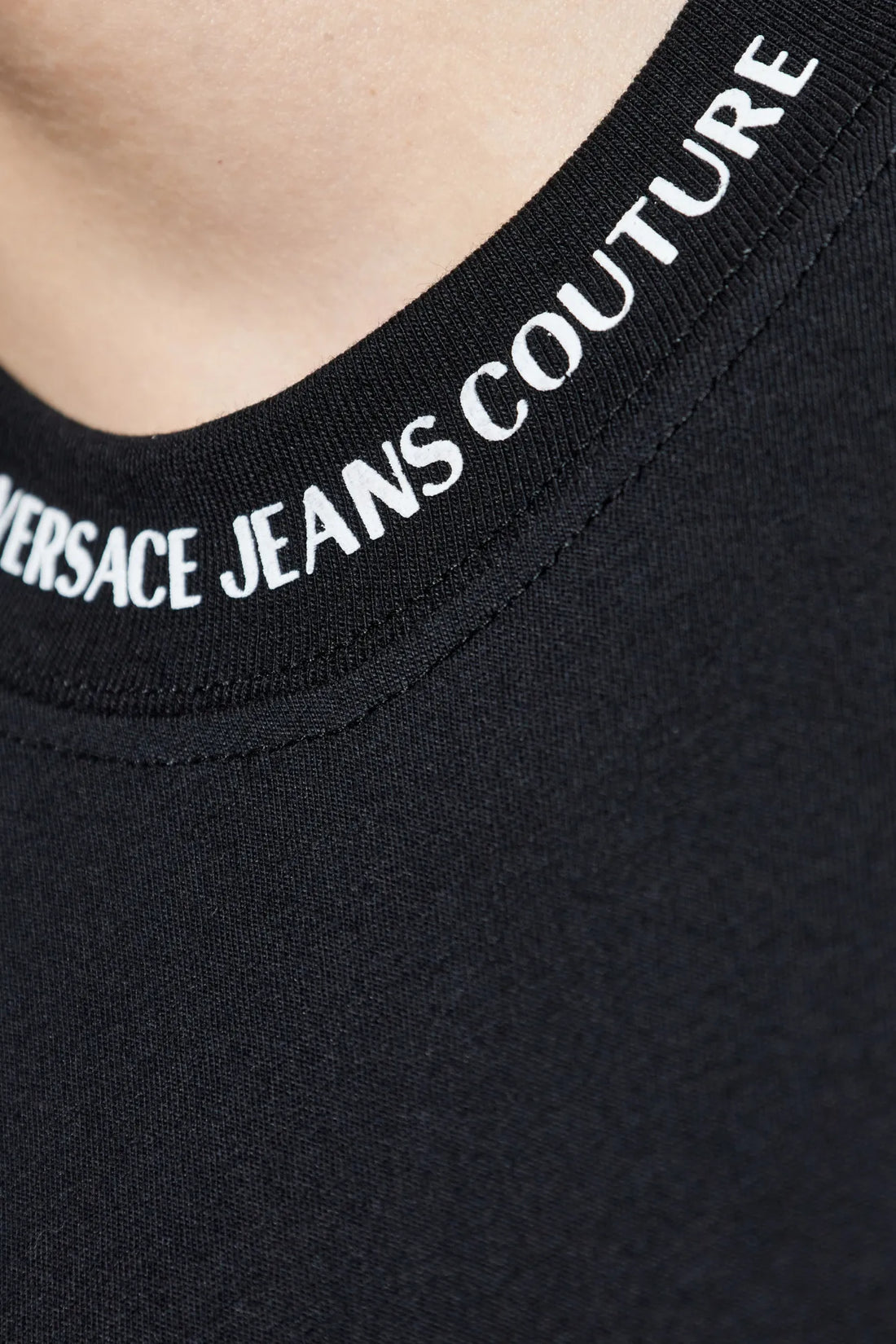 Versace Jeans Couture Black Logo Collar T-Shirt, featuring a ribbed crewneck with signature branding and a minimalist chest pocket, crafted for everyday sophistication, available at Lestyle Boutique.