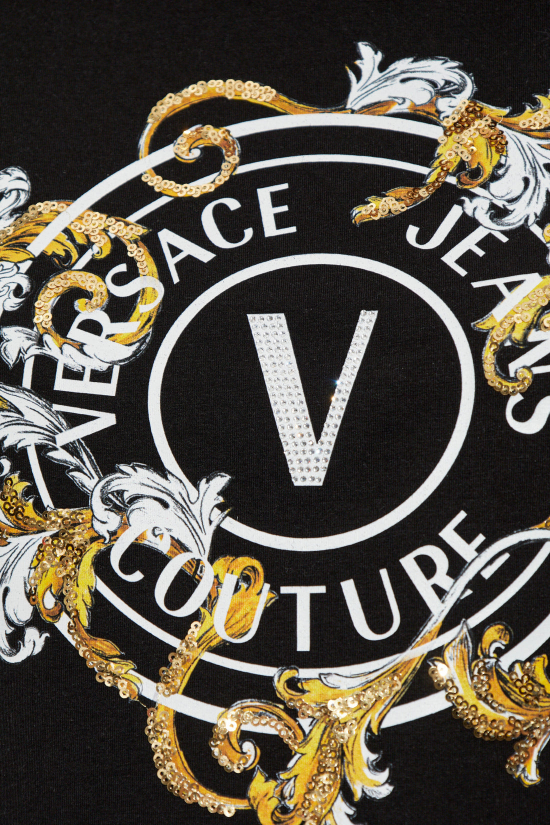 Versace Jeans Couture Black T-Shirt with shimmering appliques and decorative print, featuring the iconic V-Emblem logo, perfect for a chic street style look, available at Lestyle Boutique.
