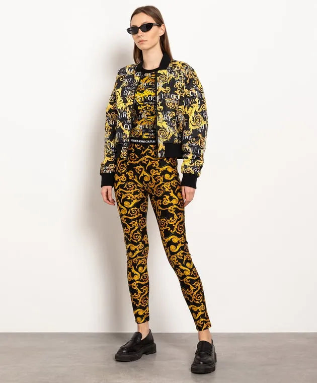 Versace Jeans Couture black leggings in a polyamide-elastane blend featuring the Sketch Couture print and an elastic logo waistband, available at Lestyle Boutique 136 Little Collins St.