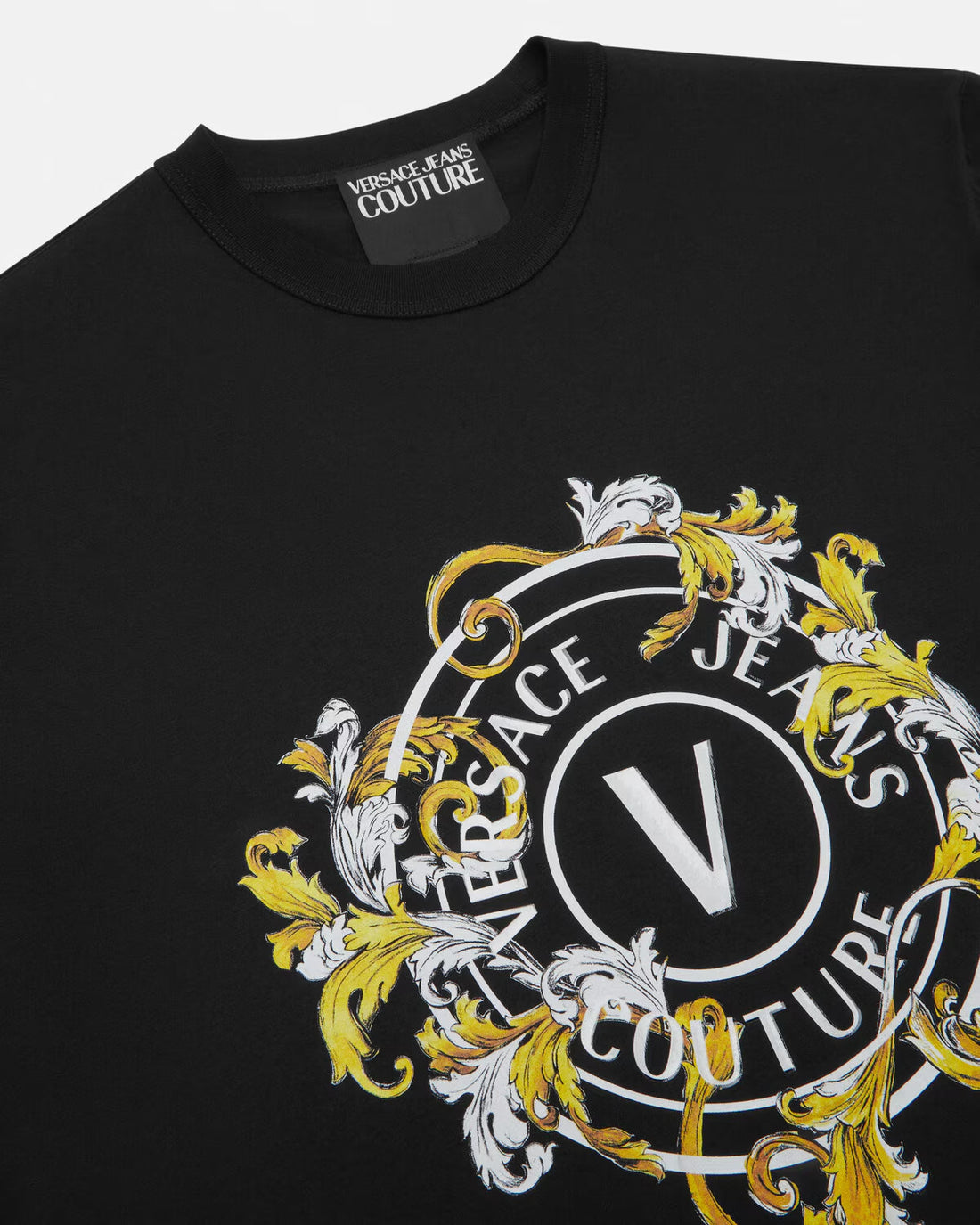 Versace Jeans Couture V-Emblem Regular-Fit T-Shirt in black and gold, featuring a bold Outline Barocco motif and signature V-Emblem logo. Designed for casual luxury, available at Lestyle Boutique.