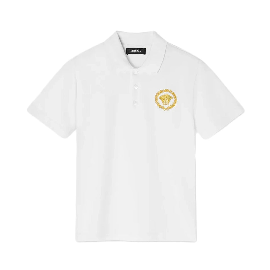 Versace Kids Short-Sleeved Polo Shirt in white, featuring a breathable cotton piqué fabric, Medusa Kids motif embroidery, and a classic pointed collar, available at Lestyle Boutique.