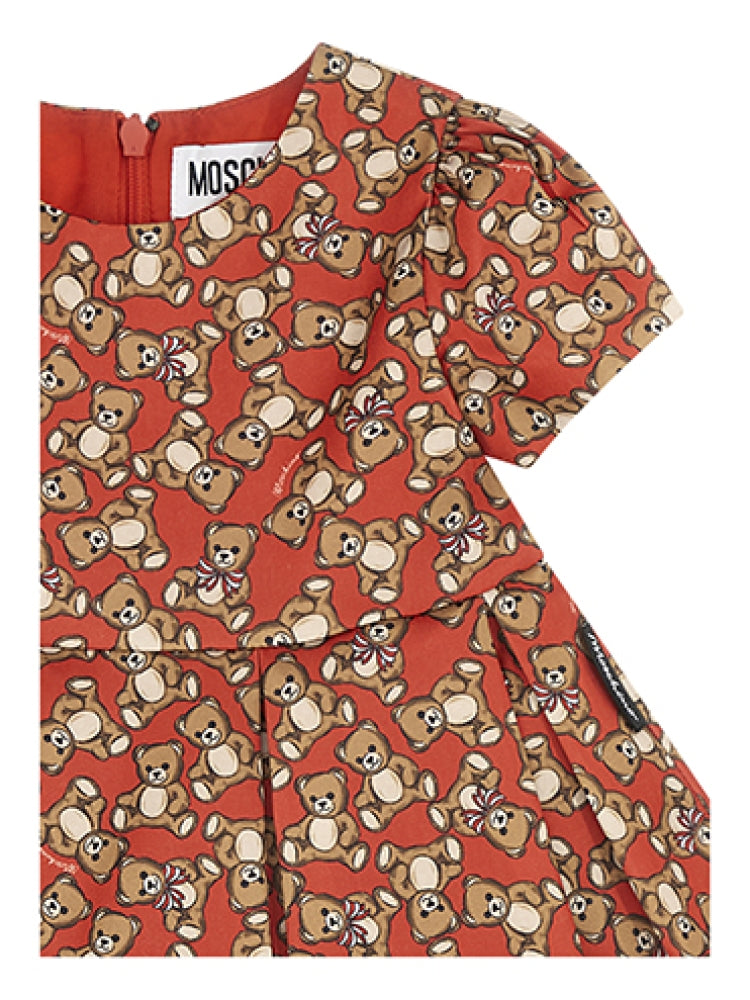 Moschino infant dress featuring teddy bear logo all over available at Lestyle Boutique Melbourne