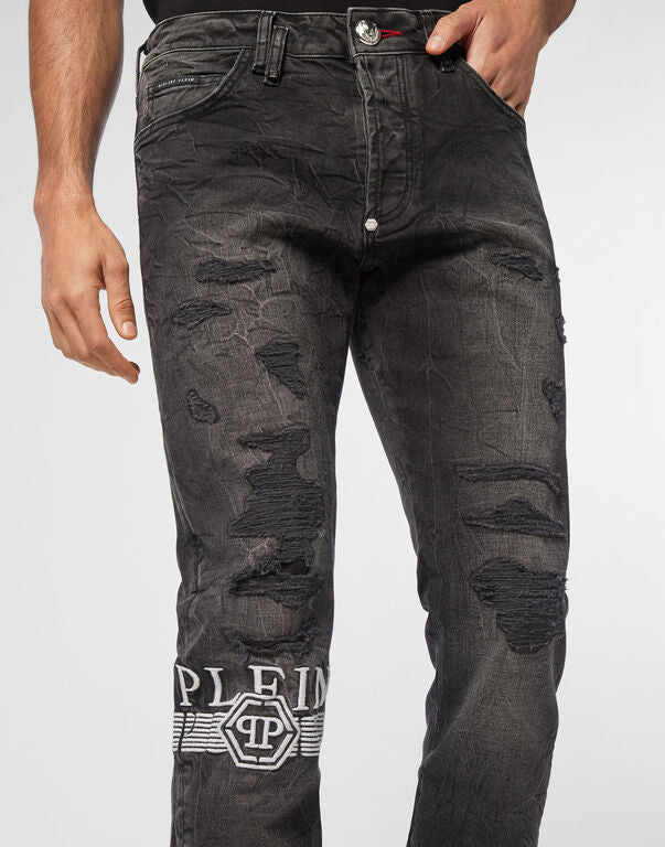 Philipp Plein black distressed super straight-cut jeans with logo detailing, available at Lestyle Boutique.