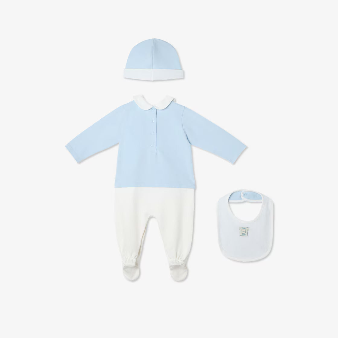Baby clothing set with light blue shirt, white pants, hat, and bib on a white background