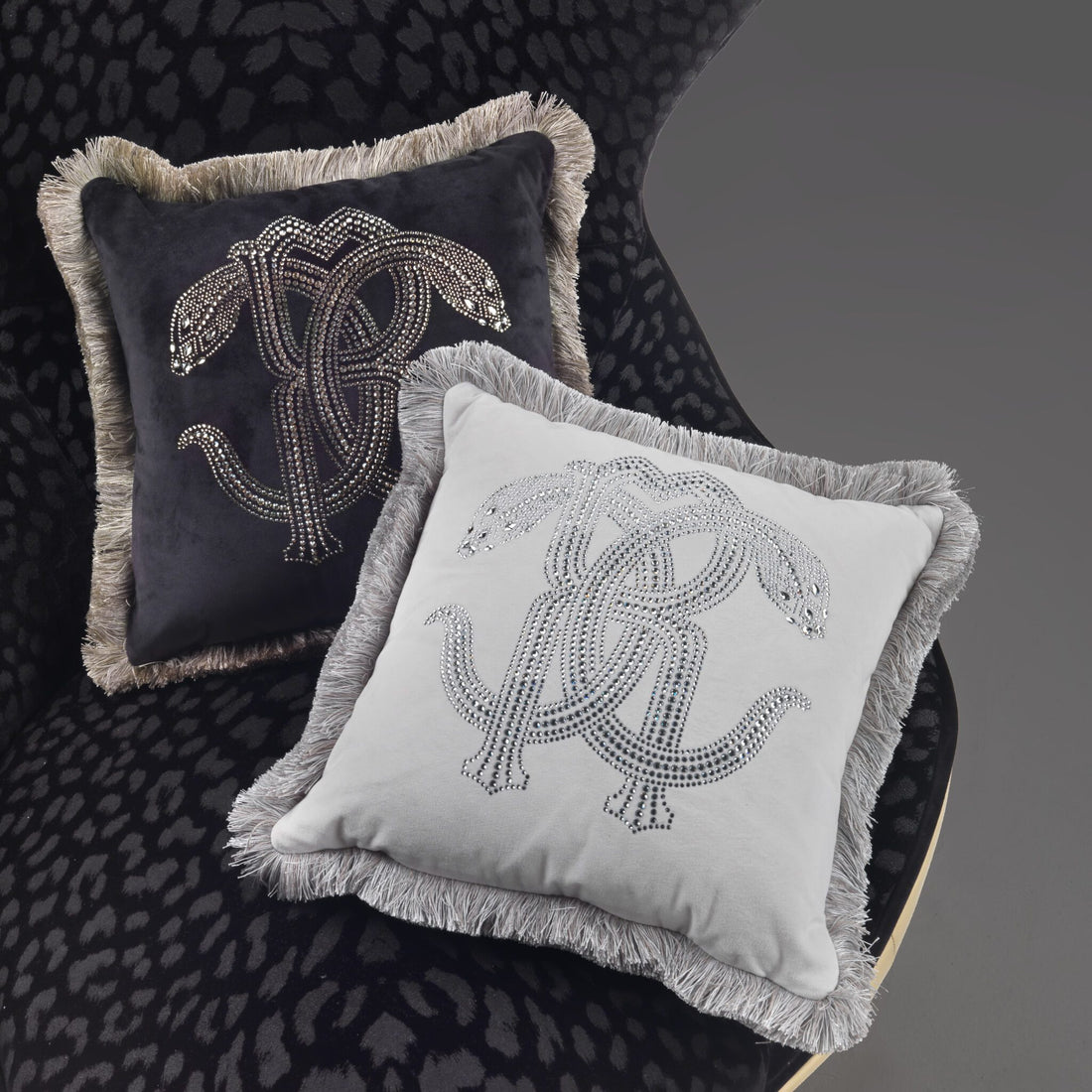 Roberto Cavalli cushion featuring a crystal snake design, available at Lestyle Boutique Melbourne
