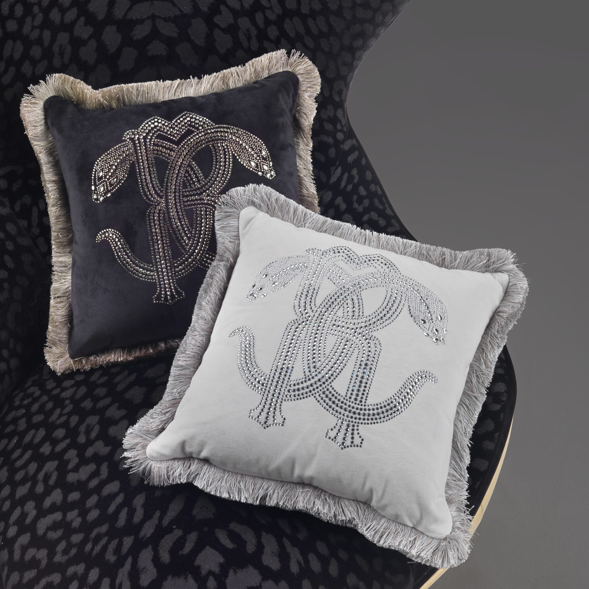 Roberto Cavalli cushion featuring a crystal snake design, available at Lestyle Boutique Melbourne