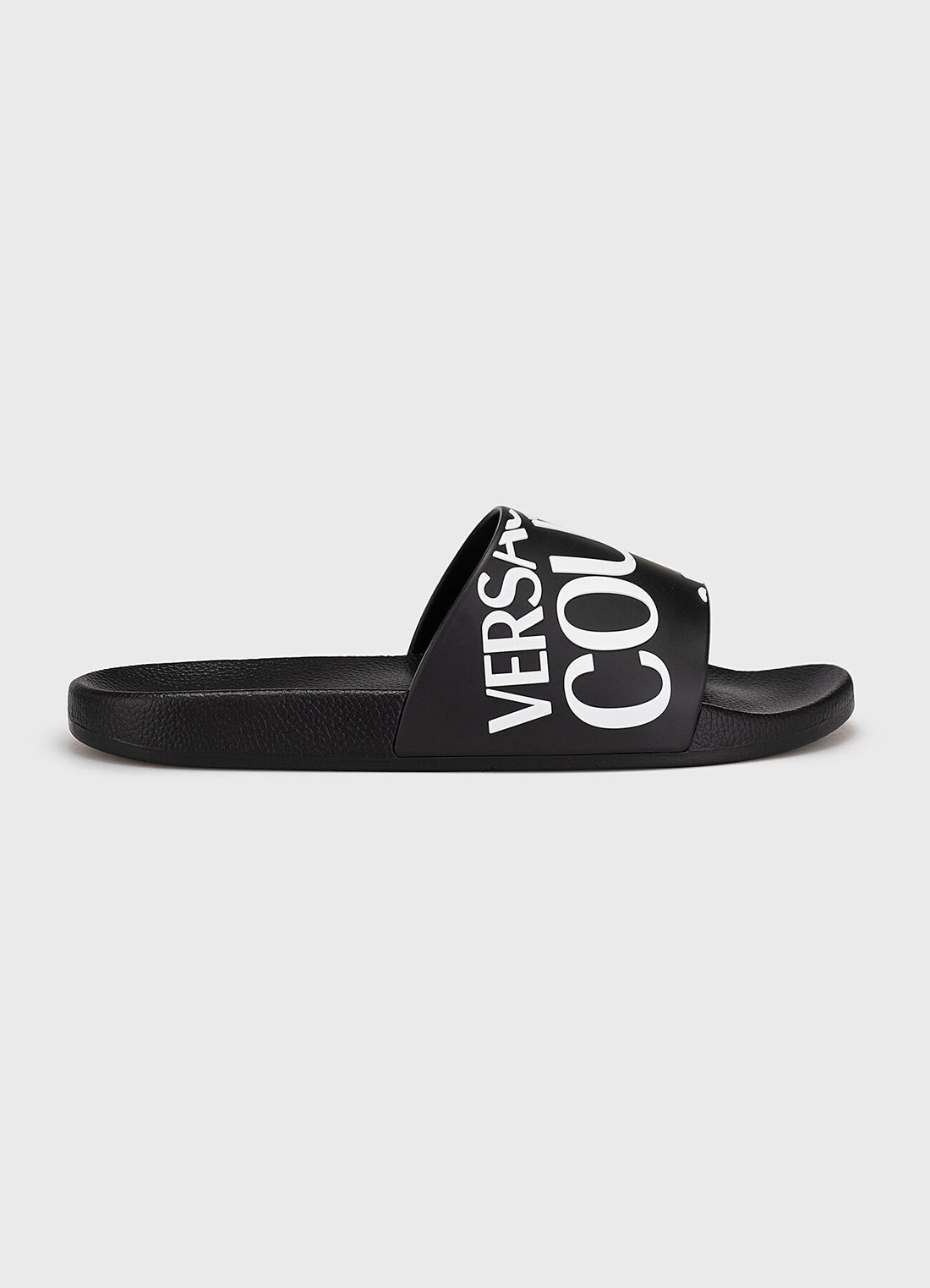 Versace Jeans Couture Fondo Slide sandals featuring embossed tonal logo lettering available at Lestyle Boutique Melbourne