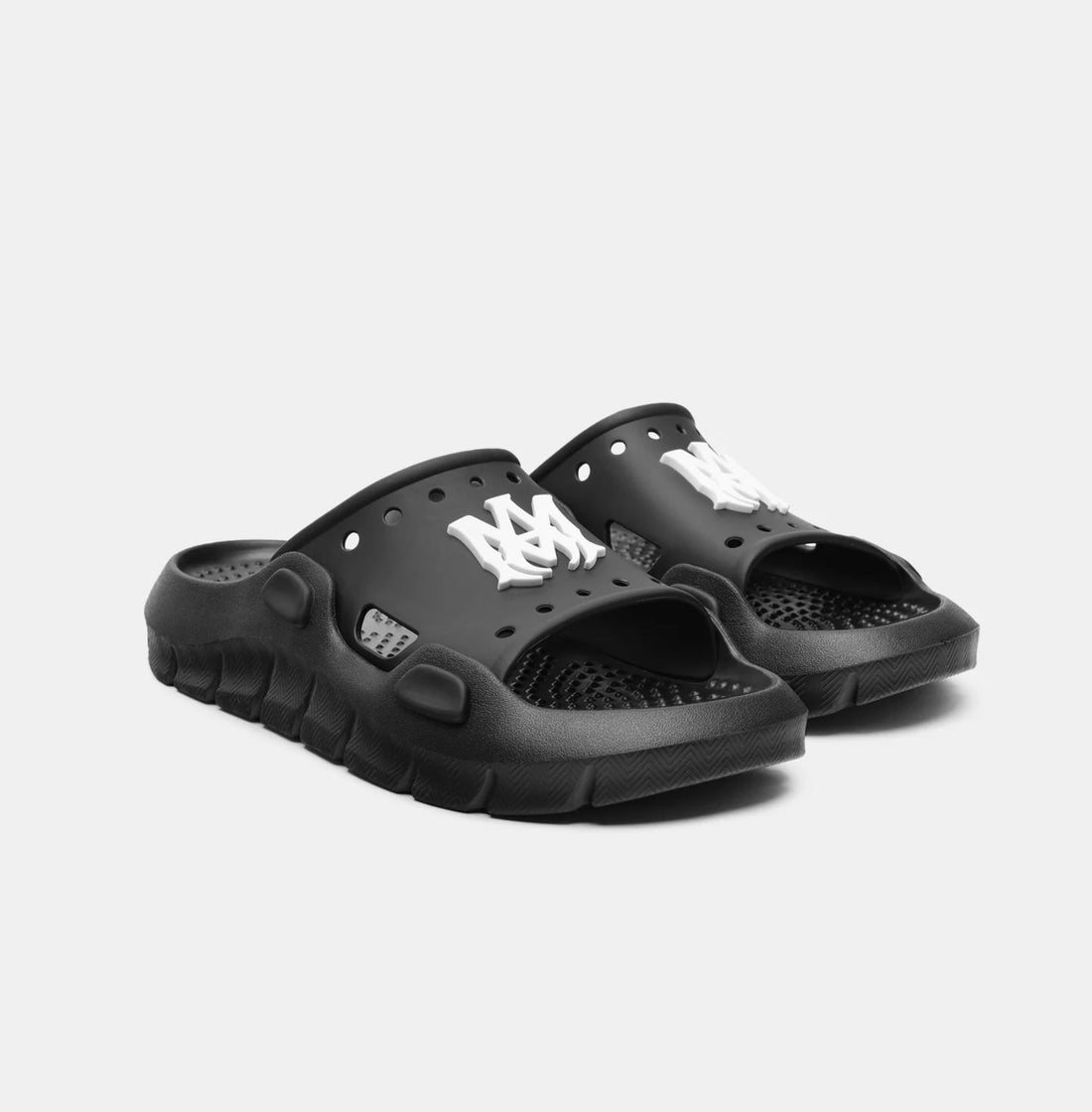 AMIRI Slippers featuring perforated strap with white logo available at Lestyle Boutique Melbourne