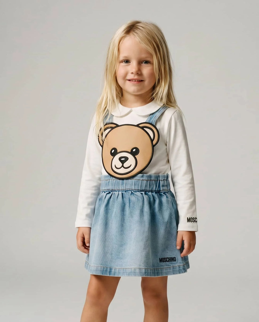MOSCHINO KIDS DRESS featuring embroidered Teddy Bear artwork available at Lestyle Boutique Melbourne