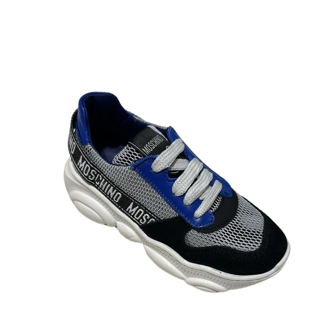 Moschino Kids multicolor lace-up sneakers with mesh panels, a chunky white sole, and a black logo heel strap, available at Lestyle Boutique 136 Little Collins St.