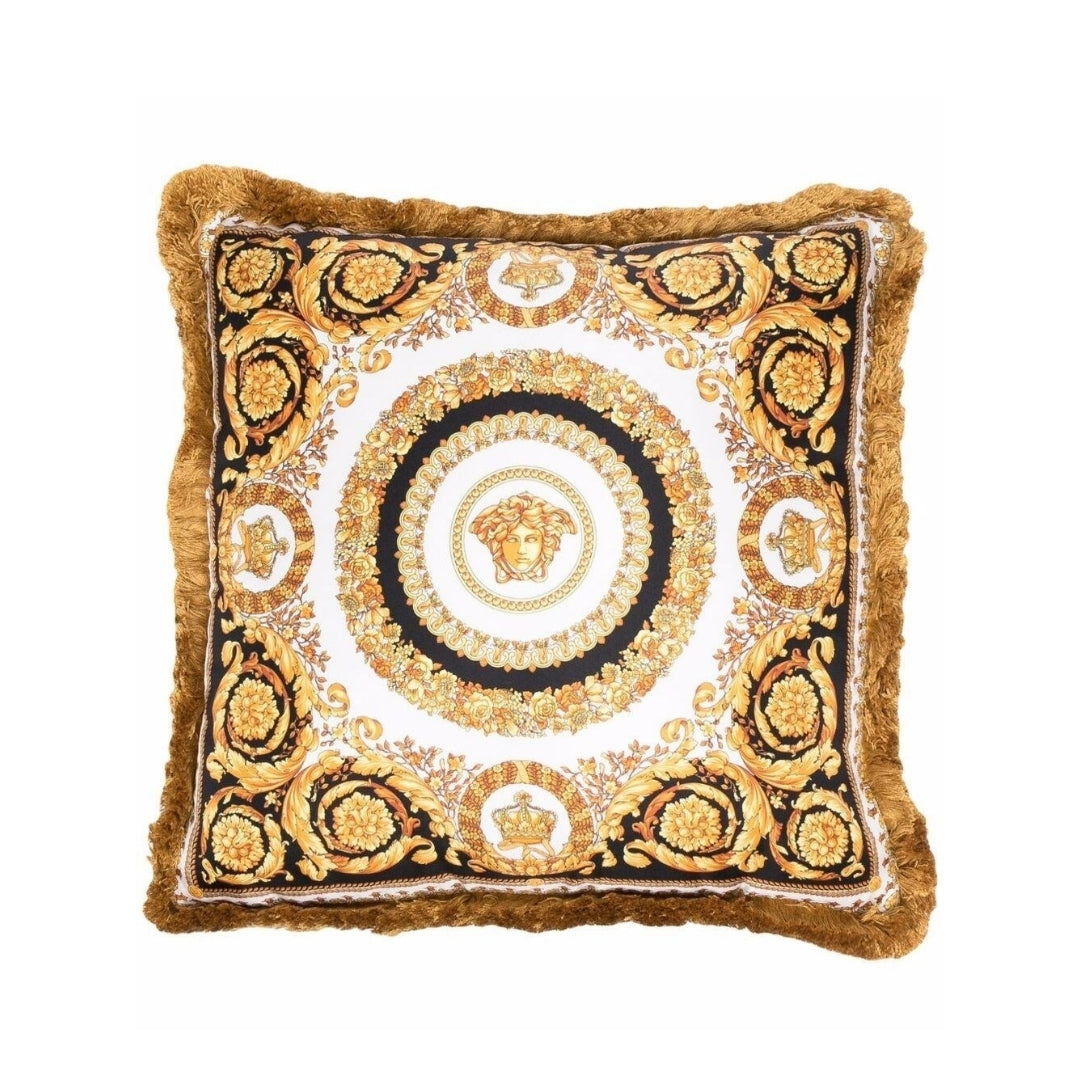 Versace gold, black and white silk pillow featuring a characteristic Baroque print, two-tone design and fringed border, made of silk and synthetic fibers, available at Lestyle Boutique 136 Little Collins St.