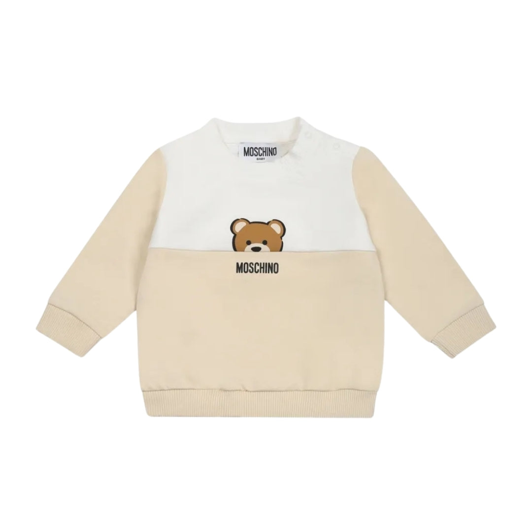 Moschino Kids Baby color-block sweatshirt featuring a white/cream upper and beige lower section, crew neck, long sleeves, ribbed trims, and a Teddy Bear motif, available at Lestyle Boutique 136 Little Collins St.