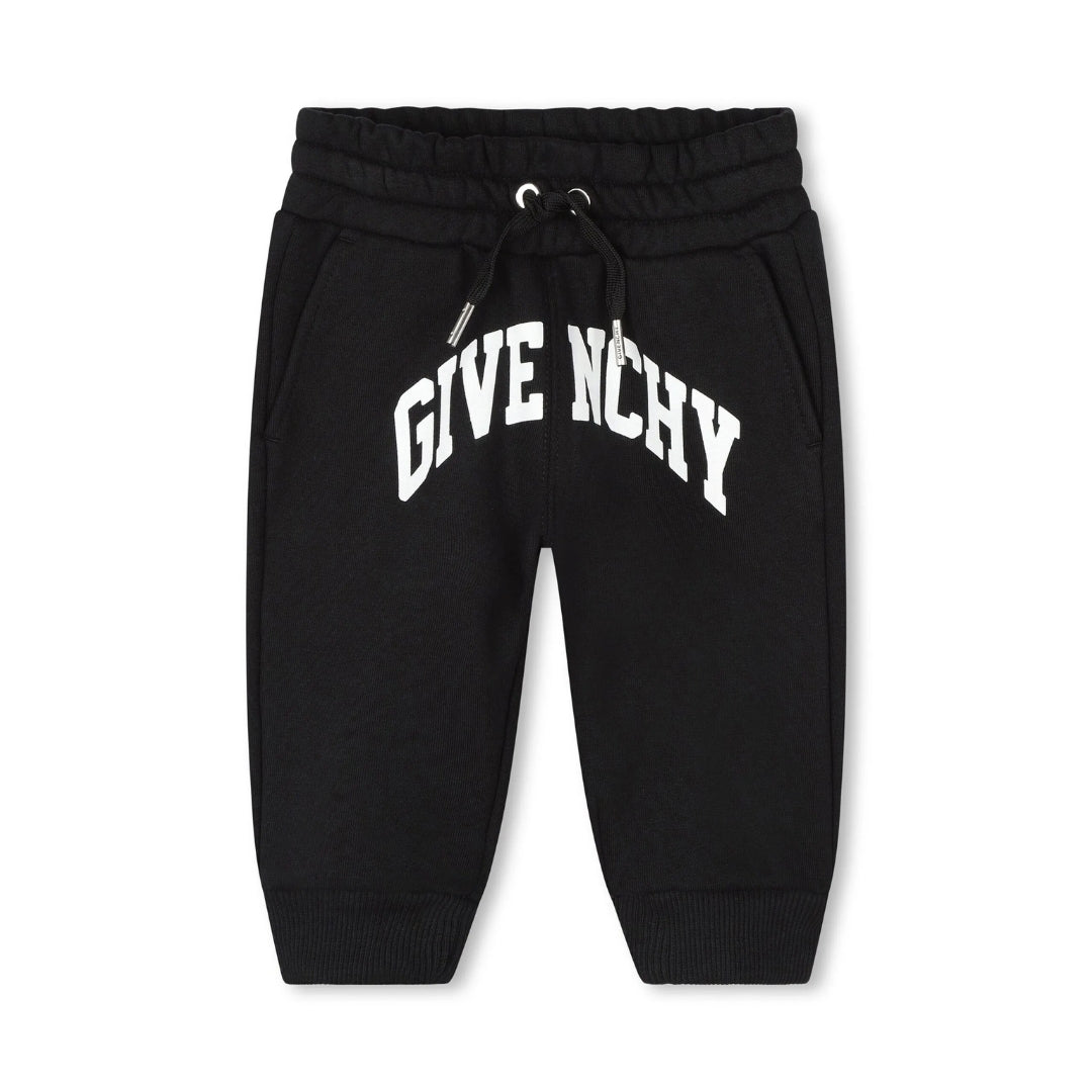 Givenchy Kids black and white cotton blend track pants with 4G-motif, front logo print, and elasticated drawstring waistband, available at Lestyle Boutique 136 Little Collins St.