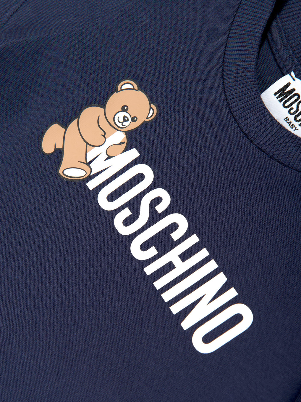 Moschino Baby Teddy Bear Logo T-Shirt featuring teddy bear graphic in navy, available at Lestyle Boutique Melbourne