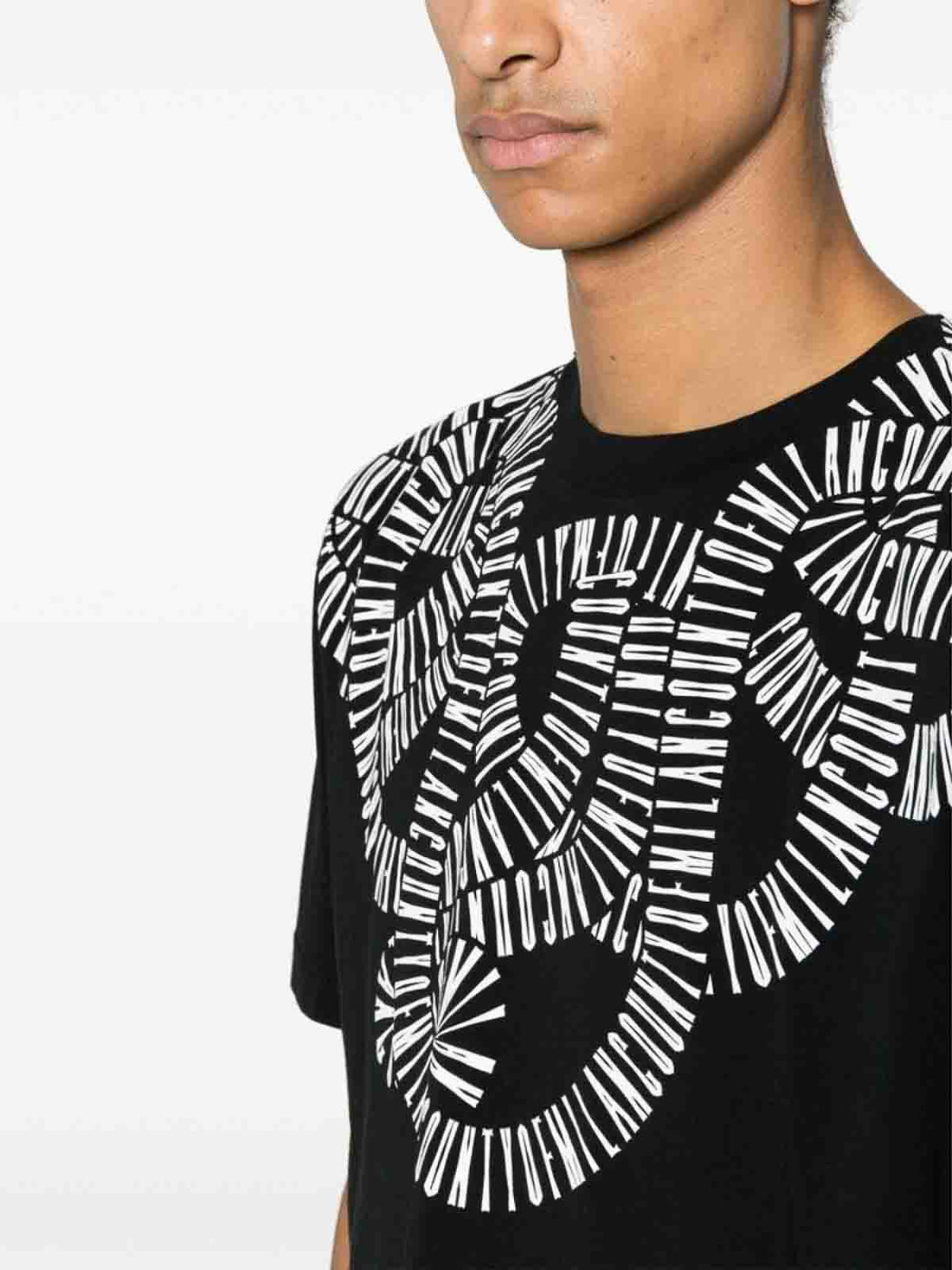 Marcelo Burlon County of Milan Logo Print T-shirt in black with white text design, short sleeves, and crew neck, available at Lestyle Boutique Melbourne.