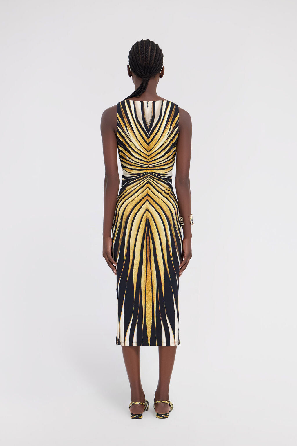 Roberto Cavalli Ray of Gold Print Fitted Dress in Gold, featuring a bold striped pattern, available at Lestyle Boutique Melbourne.