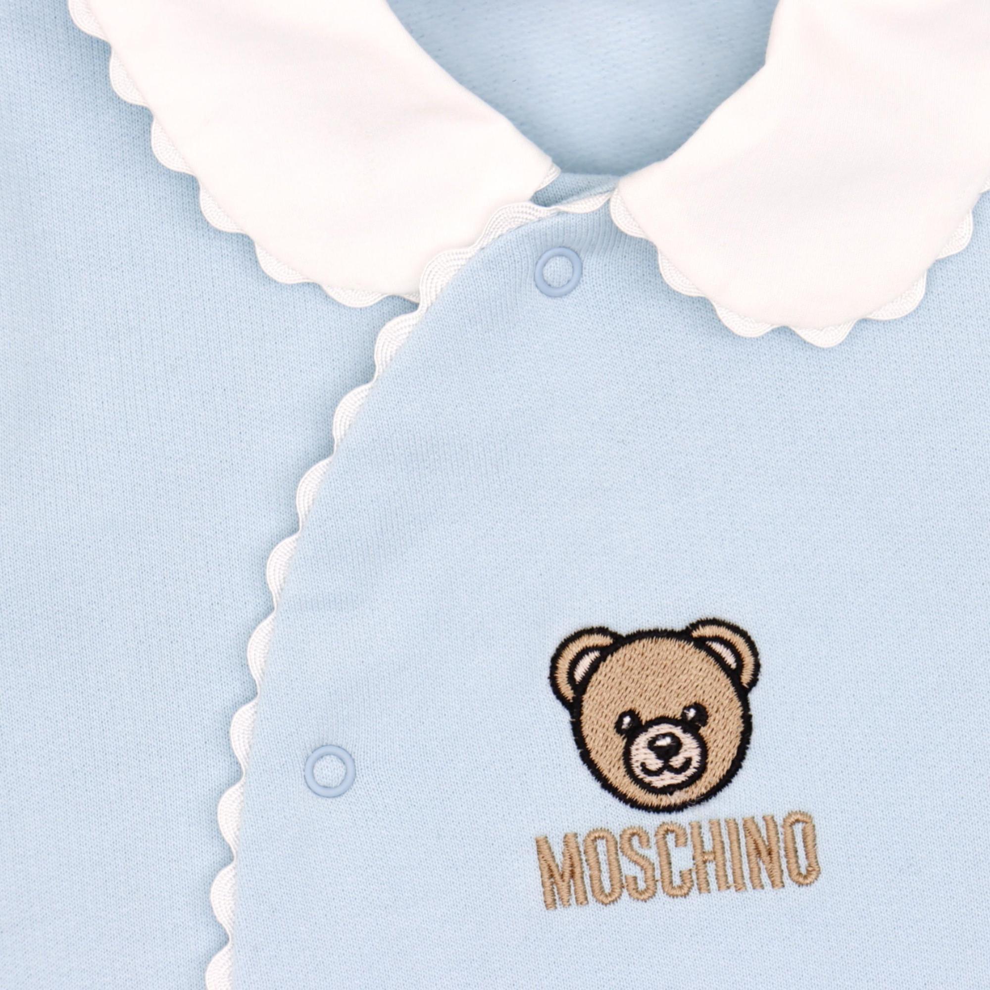 MOSCHINO baby romper set featuring teddy bear logo in pastel blue available at Lestyle Boutique Melbourne