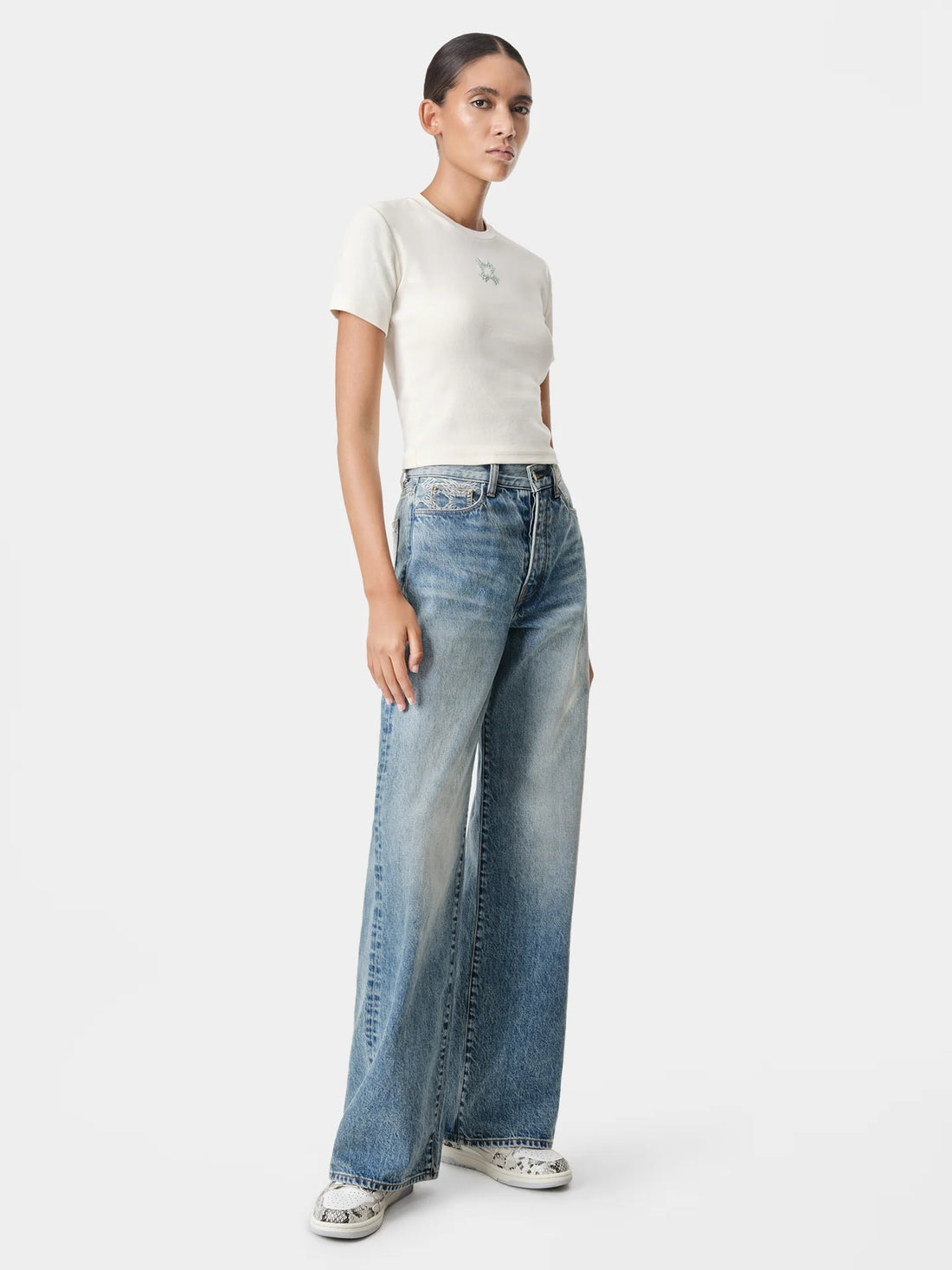 Amiri women's high-rise wide jeans in classic mid indigo, available at Lestyle Boutique Melbourne.