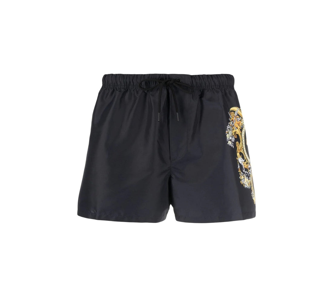 Versace swim shorts in black with multicolour baroque logo print on the side, featuring a drawstring waist and rear patch pocket, available at Lestyle Boutique 136 Little Collins St.

