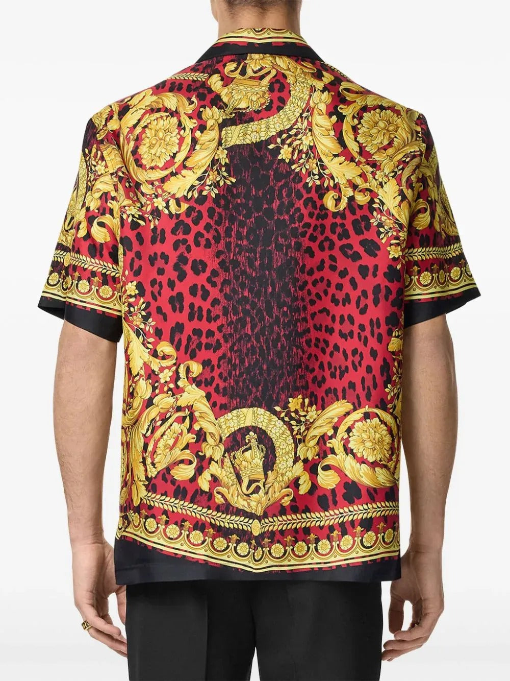 Short-sleeve shirt with intricate gold and red baroque pattern on a white background