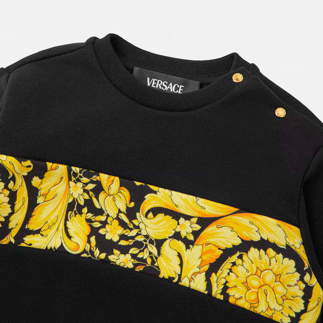 Versace Black Sweatshirt for Baby with Barocco Print in striking black and yellow colourway, featuring snap-button shoulder closures and ribbed cuffs for style and functionality, available at Lestyle Boutique.