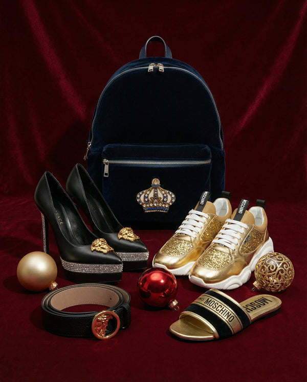 Collection of fashion items including a black backpack, high heels, sneakers, and accessories on a red background.
