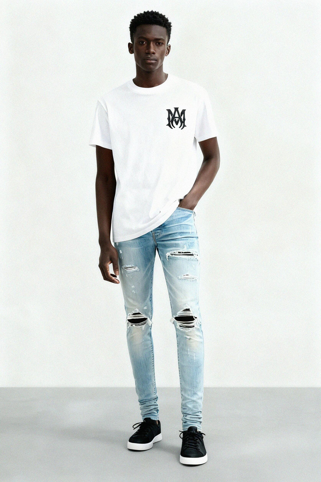 AMIRI JEANS featuring distressed, ripped knee details and vintage-wash finish available at Lestyle Boutique Melbourne