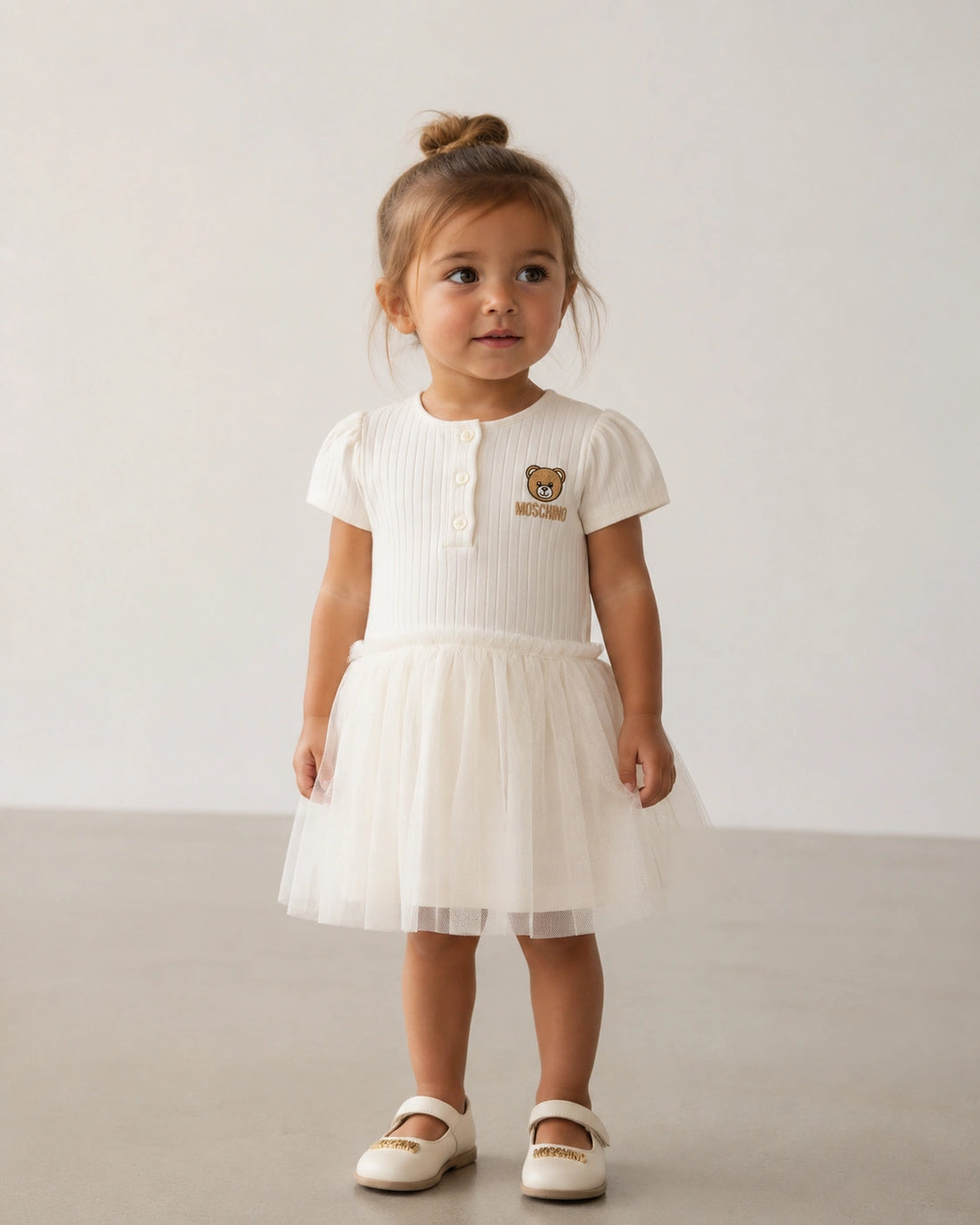 Moschino baby dress featuring teddy bear logo available at Lestyle Boutique Melbourne