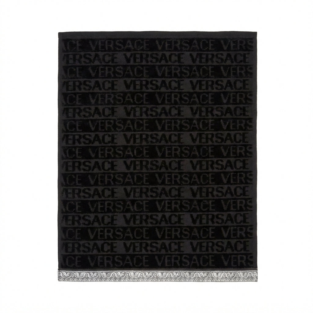 Versace small towel featuring bold logo pattern available at Lestyle Boutique Melbourne