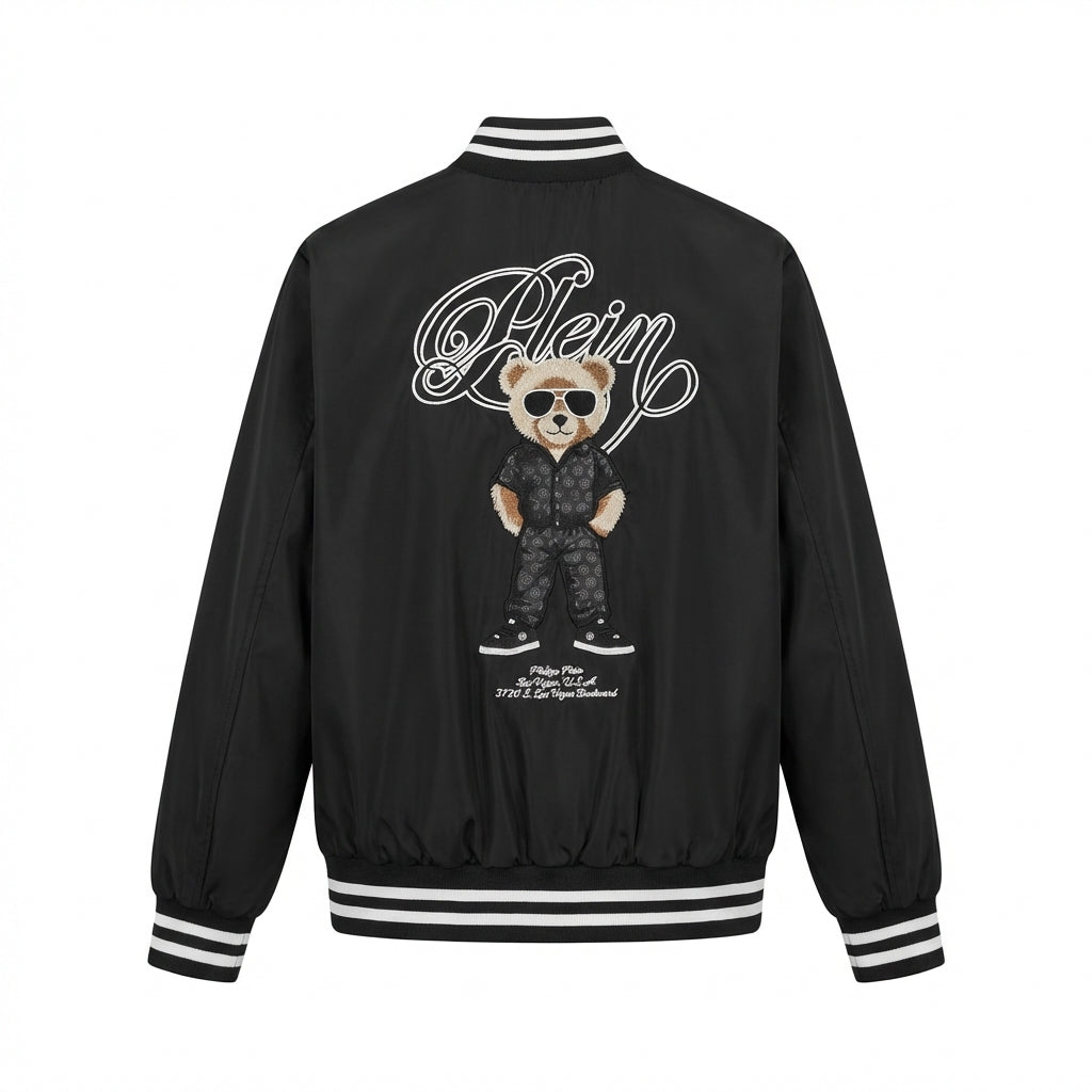 Black bomber jacket with teddy bear graphic and 'Plein' branding on a white background