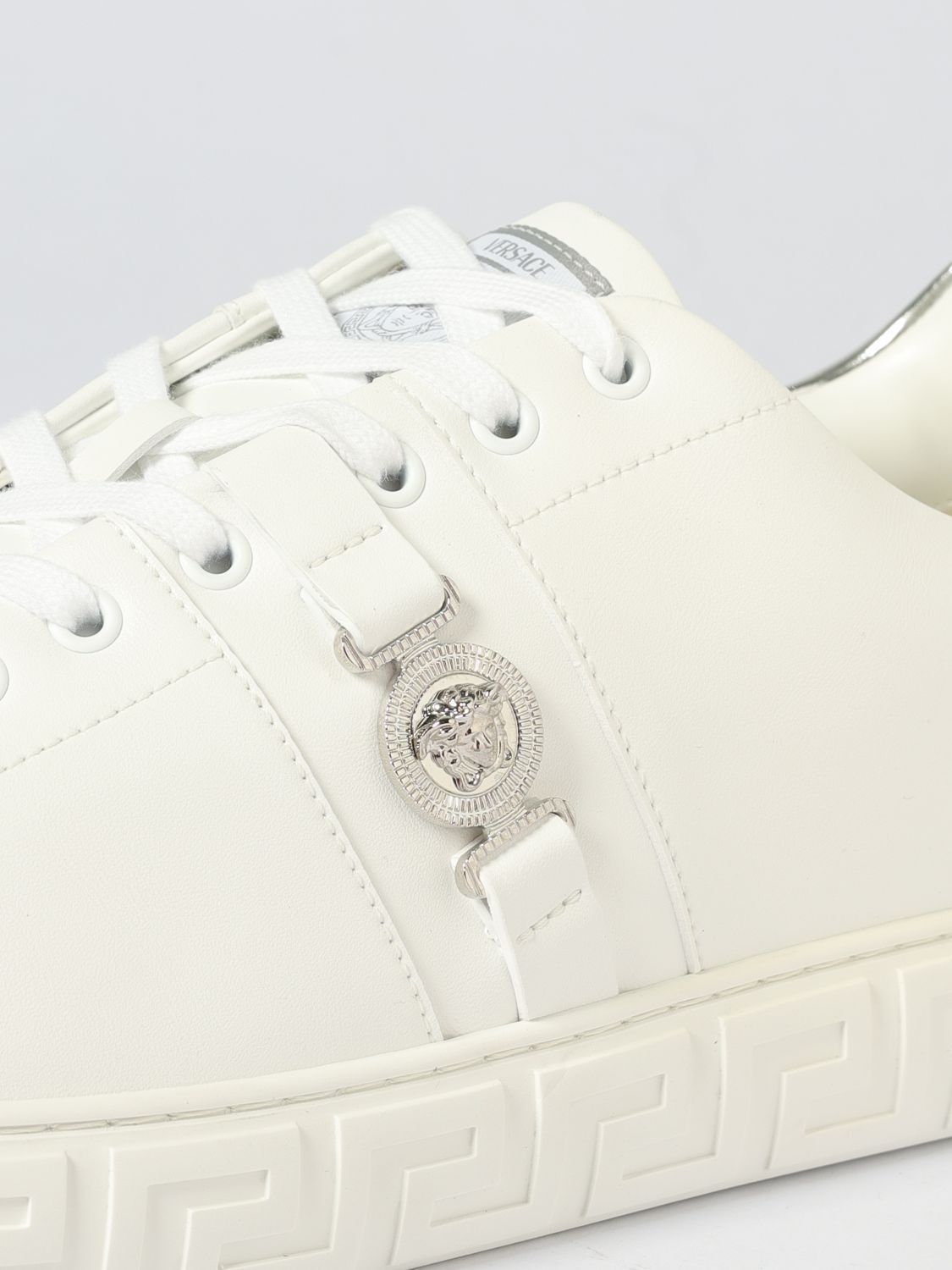 White sneakers featuring metallic heel tab available at Lestyle Boutique Melbourne