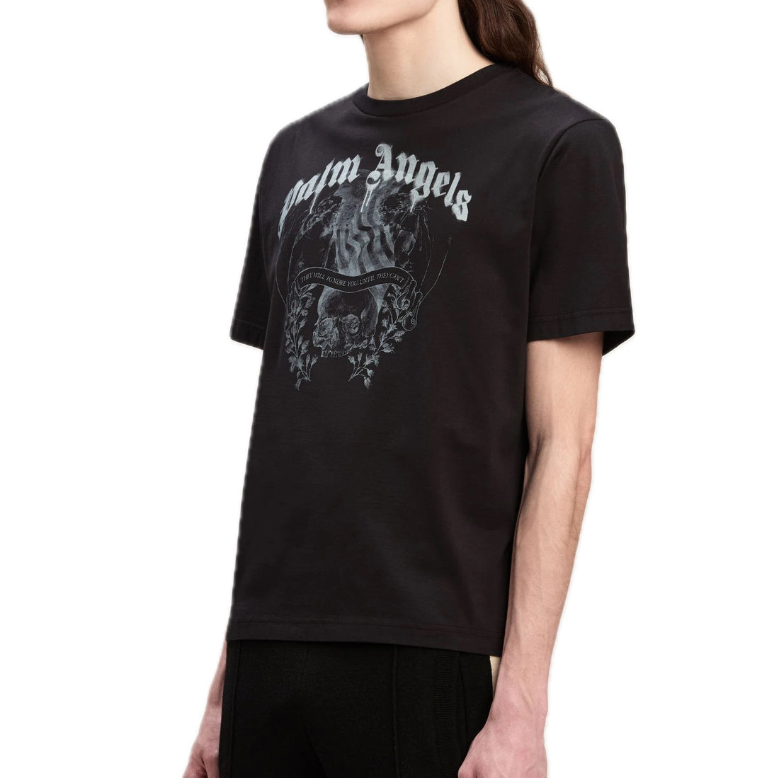 Palm Angels black statement pencil T-shirt with skull and floral graphic, available at Lestyle Boutique Melbourne. A bold and stylish choice for casual wear.