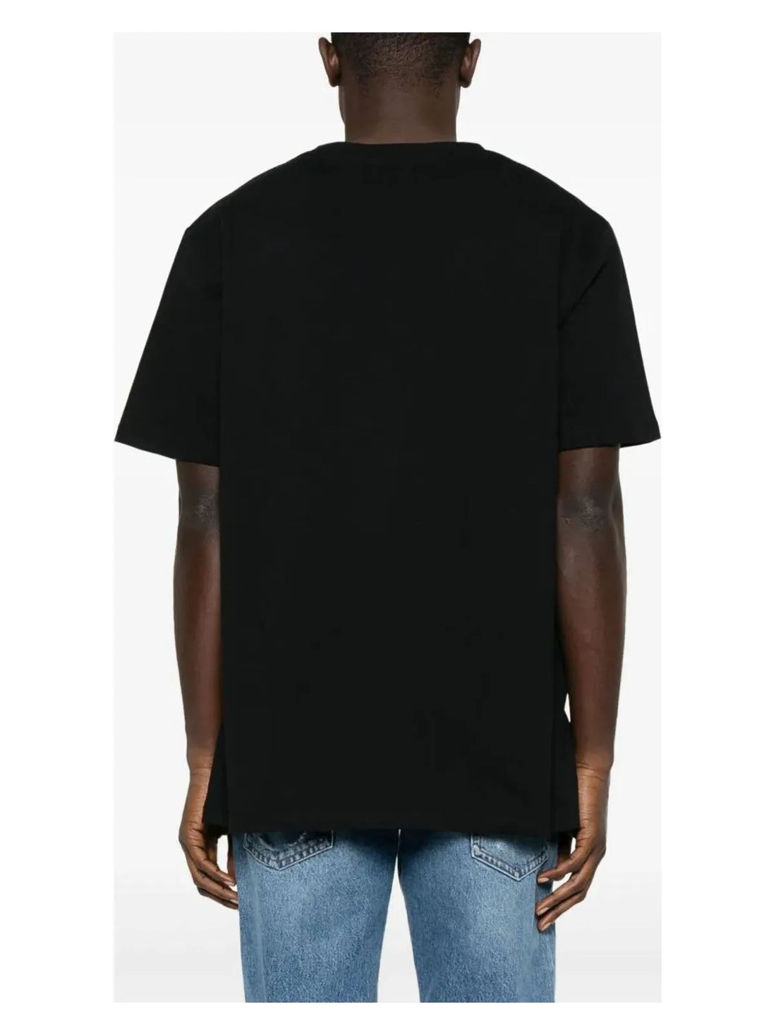 Balmain luxury black cotton t-shirt featuring a stylish loose fit and elegant script logo design. This premium designer piece is perfect for a relaxed yet sophisticated look, ideal for casual outings or elevated streetwear. The high-quality craftsmanship ensures comfort and durability, making it a must-have for fashion-forward individuals. Available at Lestyle Boutique Melbourne.