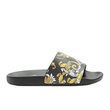 Versace Jeans Couture Fondo Slides in black with a striking gold Barocco print, featuring a branded strap and contoured footbed for ultimate comfort and luxury, available at Lestyle Boutique.