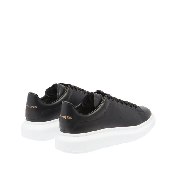 ALEXANDER-MCQUEEN-RAISED-SOLE-LEATHER-TRAINERS-1210265