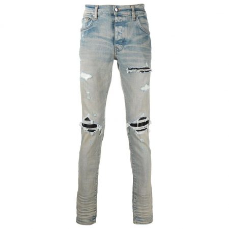 AMIRI DISTRESSED-FINISH RIPPED SKINNY JEANS