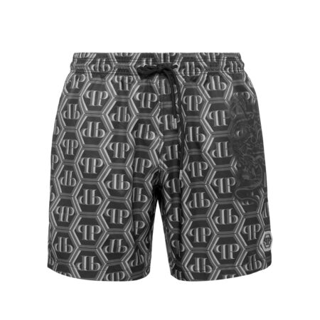 Philipp Plein black dragon monogram swim shorts with PP Hexagon logo, available at Lestyle Boutique.
