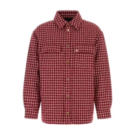 A deep red bouclé jacket by AMIRI, available at Lestyle Boutique. Featuring checked embroidery, MA metal detailing, and a classic buttoned design, this jacket is both stylish and functional.