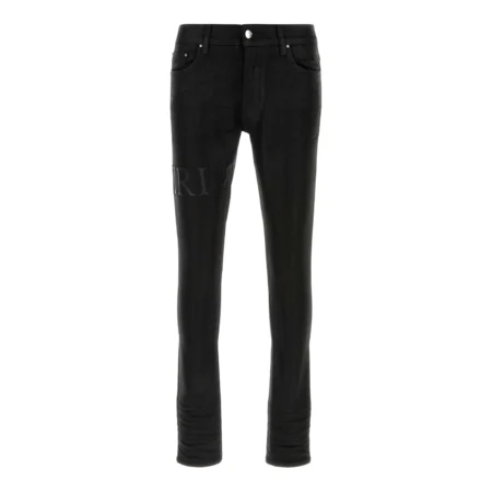 A pair of black stretch skinny jeans by AMIRI, available at Lestyle Boutique. These jeans feature a comfortable fit with a sleek design, button and zip closure, and classic five-pocket detailing.