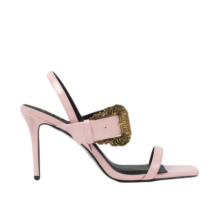 Versace Jeans Couture Baroque Buckle Emily Sandals in pastel pink with a glossy patent finish, featuring a signature Baroque buckle. Perfect for chic and elegant evening looks, available at Lestyle Boutique.