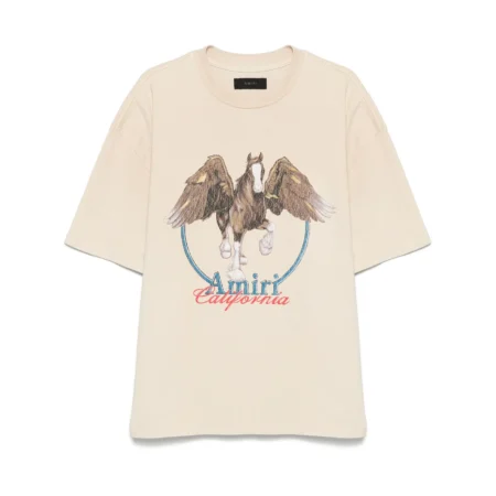 An alabaster vintage wash t-shirt by AMIRI, available at Lestyle Boutique. Featuring a bold Pegasus print and Amiri California logo, this tee offers a unique retro-inspired style.