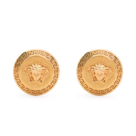 Versace Tribute Medusa Stud Earrings in gold-tone metal, featuring signature Greca detailing and the Medusa Head motif, a timeless statement piece available at Lestyle Boutique.