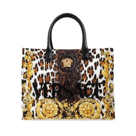 Versace Wild Barocco print top handle bag, featuring calf leather construction, Medusa emblem, and a leopard print Barocco design, available at Lestyle Boutique.