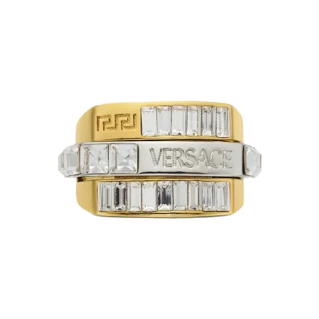 Versace Jewel Men Bandeau Ring, featuring a gold-tone brass structure with rhinestone embellishments and engraved logo, available at Lestyle Boutique.