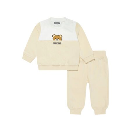 Moschino Kids Baby beige tracksuit set from the SS2025 collection, including a color-block (white/beige) sweatshirt with Teddy Bear motif and matching beige pants, available at Lestyle Boutique 136 Little Collins St.
